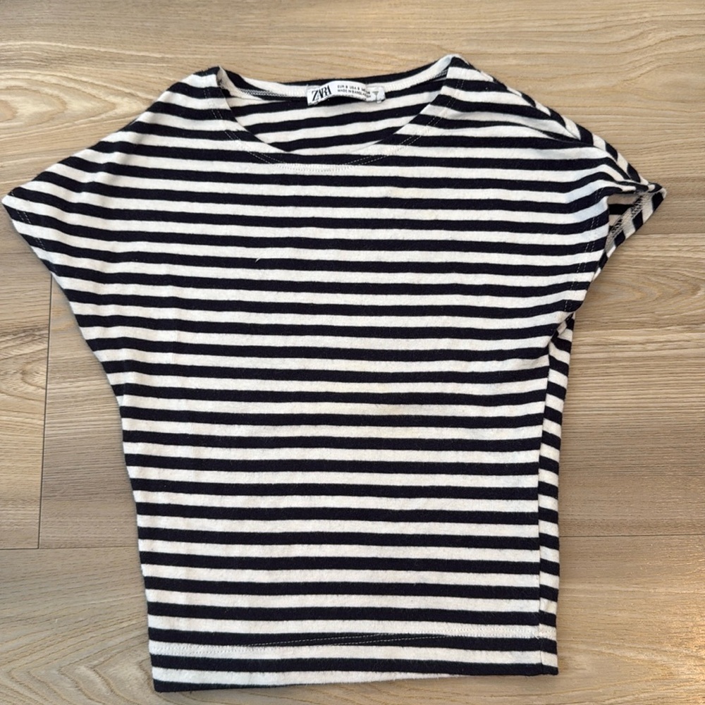 Selling this Zara black and white stripped shirt. Size S. Slightly worn.